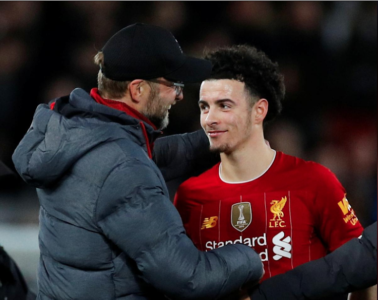 Liverpool manager Jurgen Klopp with Curtis Jones