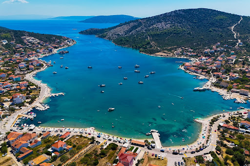 Bay lined with houses and hills - Buy this luxury house in Trogir, 5 bedrooms