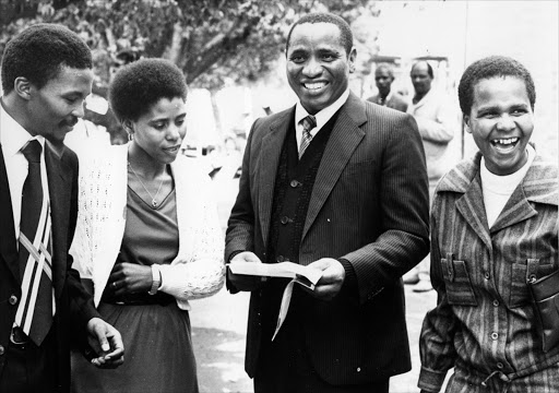 Mr. Malusi Mpumlwana, Mrs. Nohle Mohapi , her attorney Mr. Griffiths Mxenge and Dr. Mamphela Ramphele during a hearing at the Grahamstown Supreme Court where Mrs Mohapi is suing the Minister of Police for the amount of R35 000 for claiming that her husband Mr. Mapetla Mohapi [a Black Consciousness leader]had written a suicide note. Mrs. Mohapi argued that neither the note nor the signature were in her husband's handwriting. She further claimed that her husband died after being assaulted by security branch men while being held under section six of the Terrorism Act. 28/10/1979. © Sunday Times