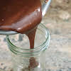 Thumbnail For Pouring Hot Fudge Into A Mason Jar.