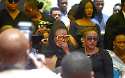 Jabulani 'HHP' Tsambo's wife Lerato Sengadi during the funeral  of her late husband  at Matlalong Cemetery,  Mahikeng, on Saturday. 