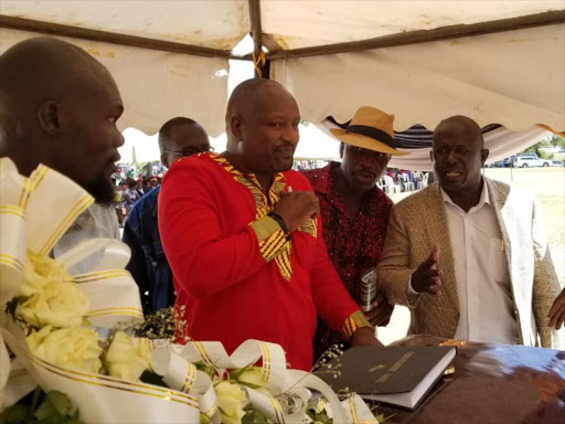 Kanu secretary general Nick Salat (in red shirt) during a burial in Kisumu county on Monday, January 14, 2019. /MAURICE ALAL