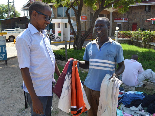 A file photo of a reformed drug addict selling clothes at a street in Diani, Kwale county. / FILE