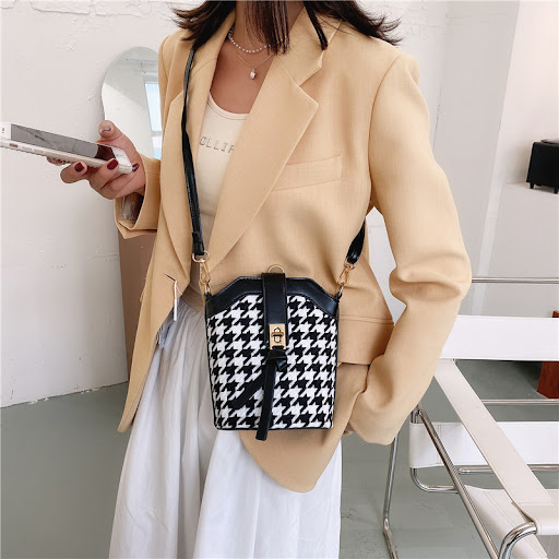 Title 7, New Stylish Character Pattern Bucket Bag. A fas...