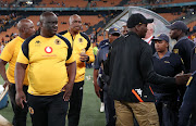 Scked Kaizer Chiefs coach Ntseki Molefi escorted by police during the 2023 Carling Black Label Knockout match against AmaZulu at the FNB Stadium on  21 October 2023.