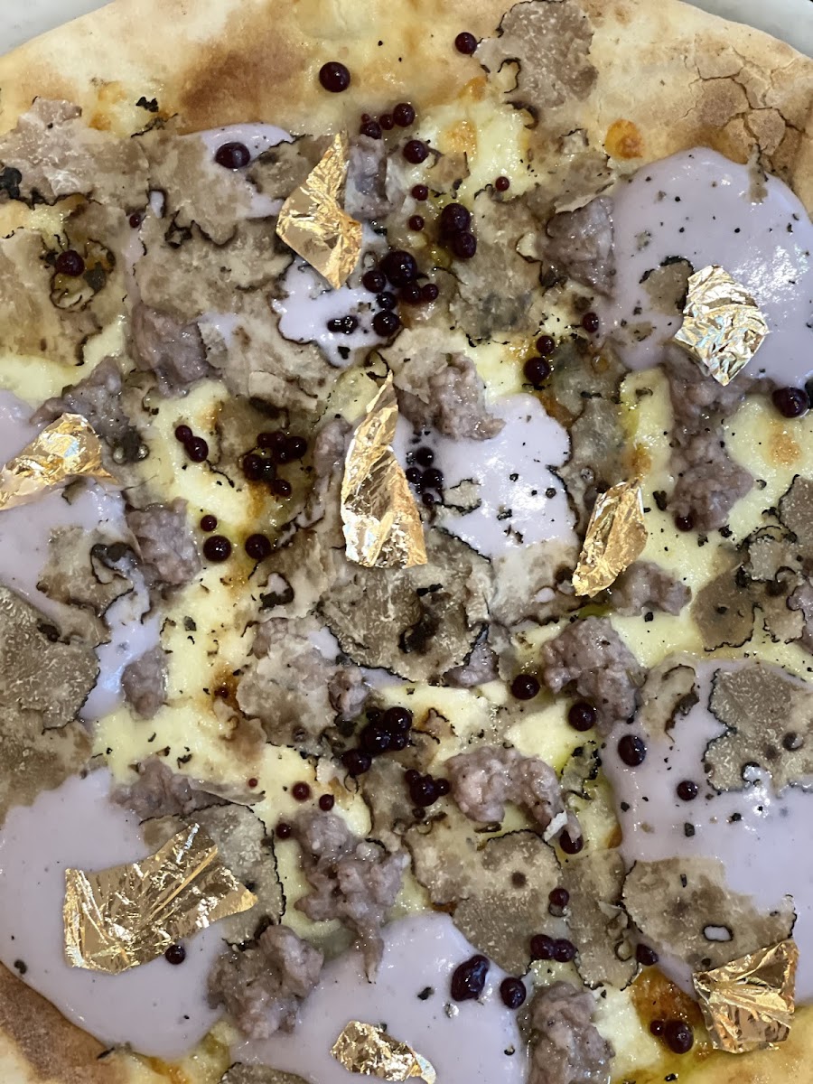 Truffles, sweet potato mousse, nero davola droplets and gold sheets