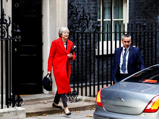 Britain's Prime Minister, Theresa May, leaves 10 Downing Street, to make a statement in the House of Commons, in London, Britain November 15, 2018. /REUTERS