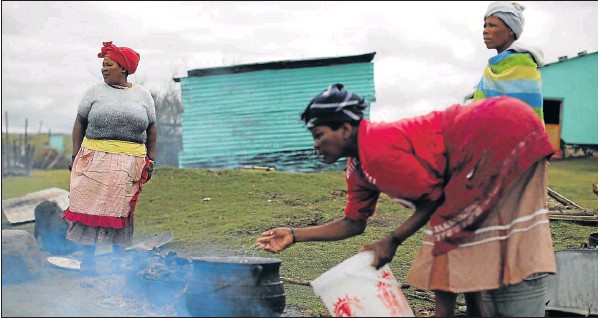 Women cook and prepare for traditional circumcision ceremonies while men are responsible for the customary practices and the decisions required in the process.