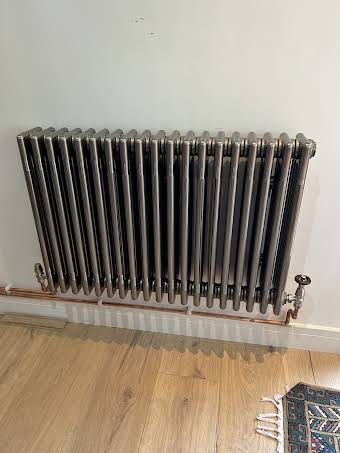 Radiator extended pipe and install album cover