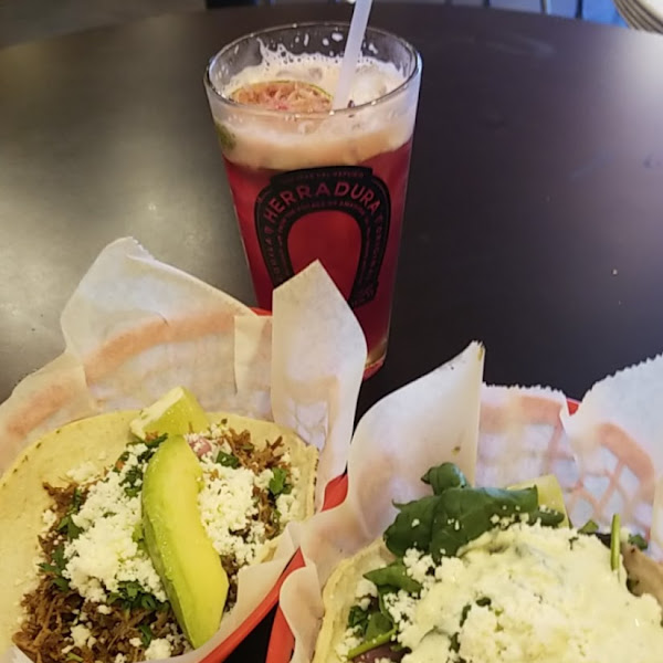 Smoked Brisket and Portabella Mushroom tacos with a hibiscus drink.