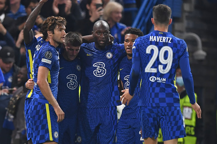 Chelsea's Belgian striker Romelu Lukaku (C) celebrates with teammates after scoring the opening goal of the UEFA Champions League Group H football match between Chelsea and Zenit St Petersburg at Stamford Bridge in London on September 14, 2021.