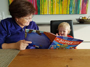 Wilhelmien van Nieuwenhuizen reads to her grandson Lukas Koorts, who was two-and-a-half when he last spent time with her. He is now four, their bond has weakened over time and their upcoming family holiday has been cancelled.