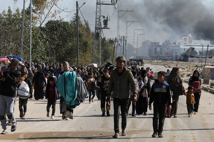 Palestinians fleeing Khan Younis in the southern Gaza Strip on January 25. South Africa has welcomed the order made by the International Court of Justice on Friday that Israel must take measures to prevent and punish direct incitement of genocide in its war in Gaza.