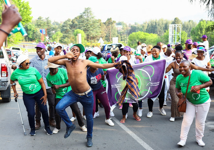 Supporters of Lesotho's Revolution For Prosperity (RFP) political party celebrate as counting of votes continues, following the Lesotho's parliamentary election in the capital Maseru, Lesotho, October 8, 2022.