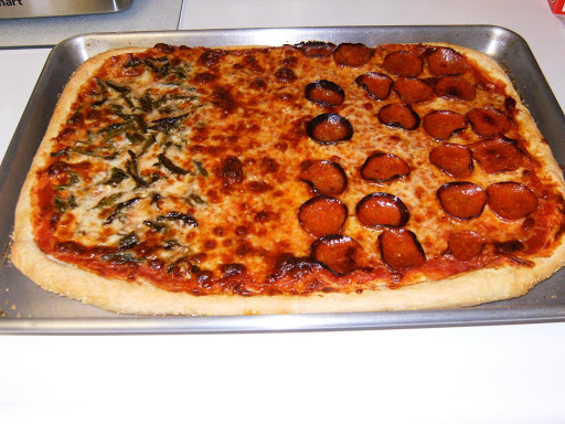 Homemade Pizza. asparagus on the left, plain cheese in the middle and pepperoni on the right.  I called it, The Italian Flag!
I used mozzarella and asiago cheeses.