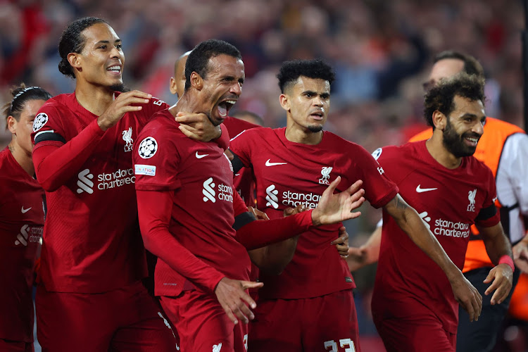 Joel Matip of Liverpool celebrates scoring the winner with Virgil van Dijk, Luis Diaz and Mohamed Salah during the UEFA Champions League group A match against Ajax at Anfield on September 13, 2022 in Liverpool. Picture: Marc Atkins/Getty Images