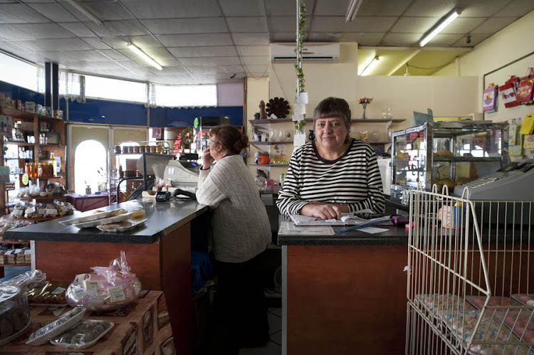 Cashier Helen Smit who says they have turned down numerous people who come seeking employment.