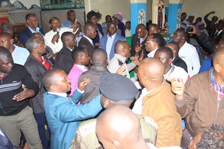 Team Kieleweke and Tangatanga members clash at a church in Murang'a on September 8.