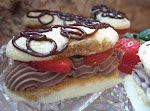 Mini Tiramisu Eclairs was pinched from <a href="http://www.food.com/recipe/mini-tiramisu-eclairs-155902" target="_blank">www.food.com.</a>