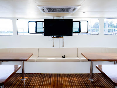 Sit in air-conditioned comfort while cruising to 4 Islands