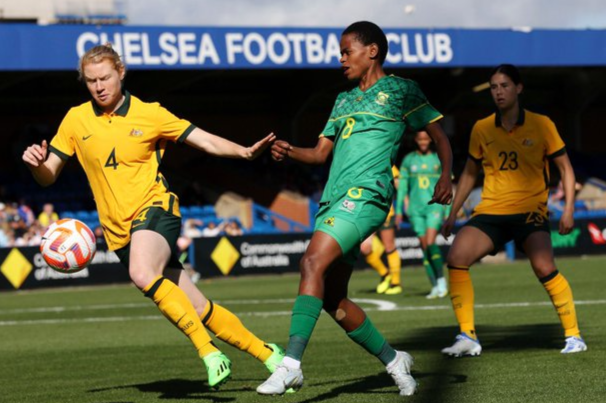 Banyana Banyana striker Hilda Magaia challenged by Charlotte Grant of Australia during their international friendly match played at Kingsmeadow Stadium in London on Saturday.
