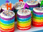 Teeny Tiny Rainbow Cakes was pinched from <a href="http://rock-ur-party.tablespoon.com/2012/03/22/teeny-tiny-rainbow-cakes/" target="_blank">rock-ur-party.tablespoon.com.</a>