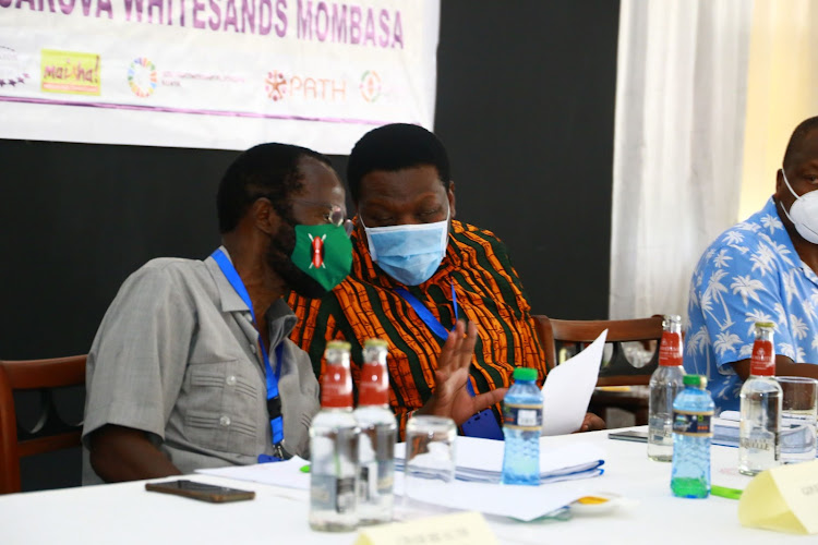 Kisumu Governor Anyang' Nyong'o and Devolution CS Eugene Wamalwa at Whitesands Hotel on Friday.