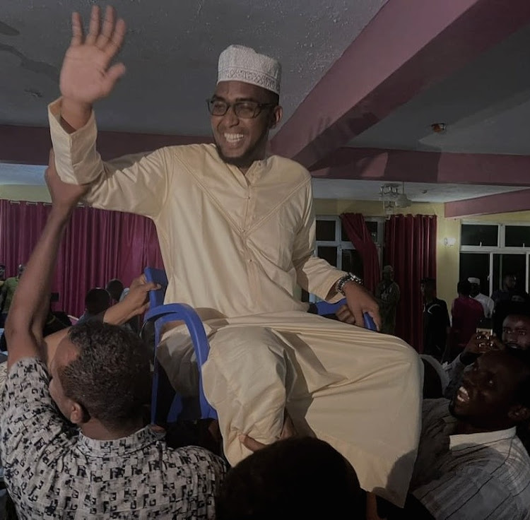 United States based software engineer Abdullahi Yussuf is lifted shoulder high by members of his Mohamed Zubeir sub clan after he was endorsed to vie for the Wajir South parliamentary seat on Sunday, February 27.