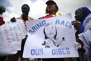 People take part in a protest demanding the release of abducted secondary school girls from the remote village of Chibok, in Lagos, Nigeria. REUTERS