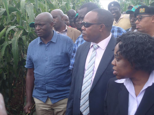 Energy and petroleum cabinet secretary Charles Keter,Kericho governor prof Paul Chepkwny(in dark glasses(c) and Kephis managing director Dr Esthet Kimani in a past agricultural exhibition at Cheborge Bureti sub county,in Kericho./SONU TANU