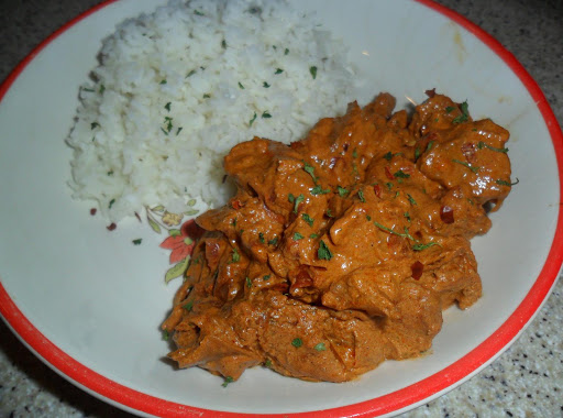 Put your Chicken Paprikash over your rice and spoon the extra creamy sauce over it.  Comfort food!