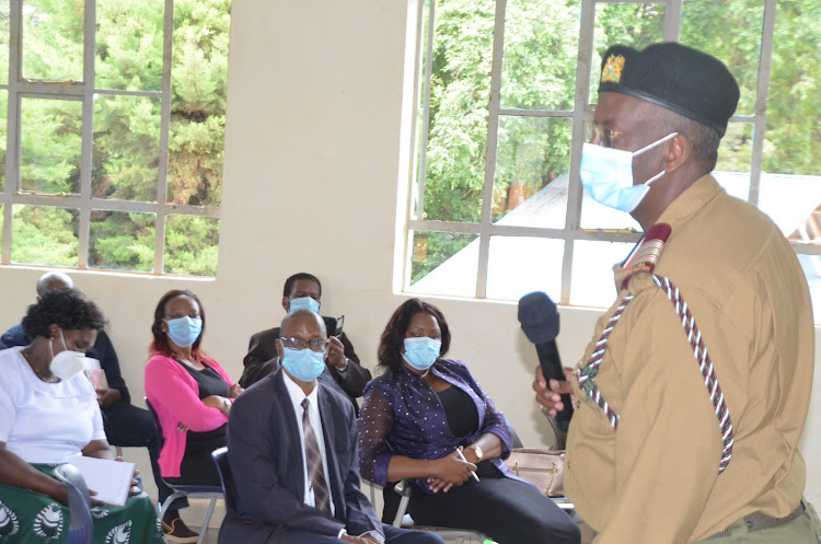 Murang’a county commissioner Mohammed Barre addresses participants during a forum to discuss proposed population policy.