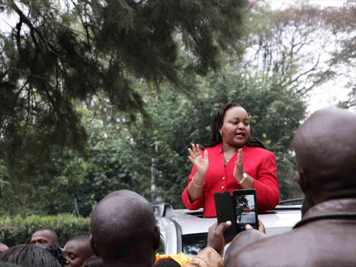 A file photo of former Devolution CS Anne Waiguru addressing her Kirinyaga supporters at the now defunct TNA offices on State House Road, Nairobi. /ISABEL WANJUI