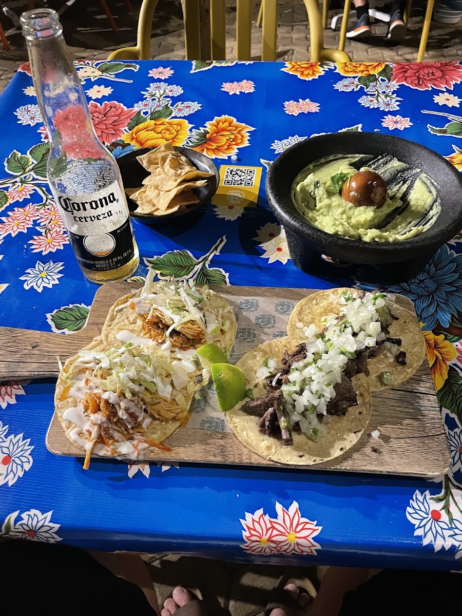 Chicken and steak tacos with guacamole