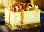 Caramel Pecan Cheesecake Squares was pinched from <a href="http://www.piarecipes.com/2012/11/caramel-pecan-cheesecake-squares.html" target="_blank">www.piarecipes.com.</a>