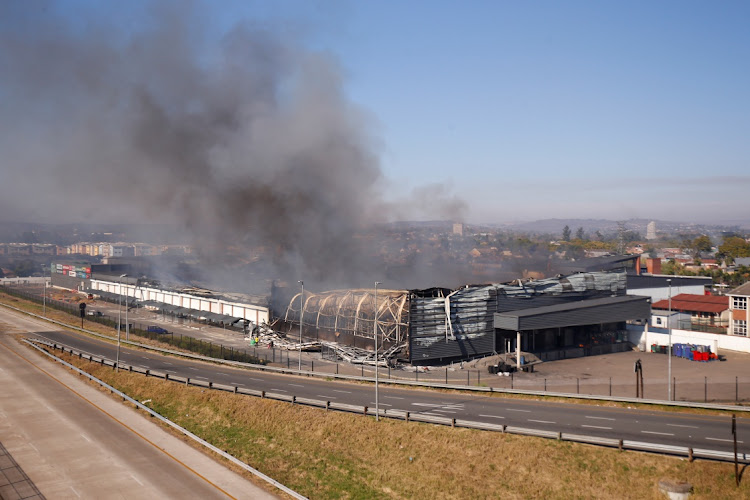 Brookside Mall in Pietermaritzburg burns after being looted as protests continue following the imprisonment of former president Jacob Zuma, on July 12 2021. REUTERS/ROGAN WARD