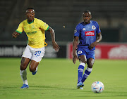 Lebohang Maboe of Mamelodi Sundowns in a tussle for the ball with Gamphani Lungu of SuperSport United during their DStv Premiership at Lucas Moripe Stadium.