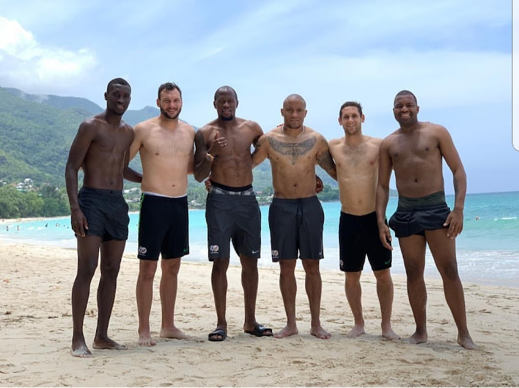 From left to Right: Bafana Bafana players Siyanda Xulu‚ Darren Keet‚ S'fiso Hlanti‚ Dino Ndlovu‚ Dean Furman and Itumeleng Khune decided not only to take a stroll on the golden sanded beaches‚ but also took time to pose for a pic.