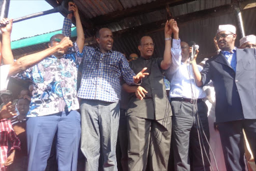 Northern region leaders Aden Duale,Nathif Jama,Mohamed Elmi and Barre Shill hold hands at Garissa primary grounds during a peaceful demonstration to denounce the activities of Al shabaab.they demanded the repatriation of the refugees saying that they were the biggest cause of insecurity in the region.Stephen Astariko