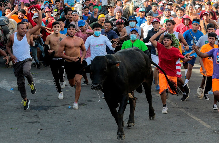 People take part in the festivities in honour of San Jeronimo, as the coronavirus disease (Covid-19) outbreak continues in Masaya, Nicaragua September 29, 2020.