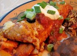 Five-Star Chicken Enchiladas was pinched from <a href="http://mexican.food.com/recipe/five-star-chicken-enchiladas-260835" target="_blank">mexican.food.com.</a>