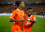 Ivory Coast's Sebastien Haller celebrates scoring their second goal with Simon Adingra in the Afcon final at Stade Olympique Alassane Ouattara, Abidjan, Ivory Coast on February 11 2024.