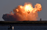 SpaceX's first super heavy-lift Starship SN8 rocket explodes during a return-landing attempt after it launched from their facility on a test flight in Boca Chica, Texas on US on December 9 2020. 
