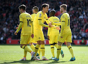 Timo Werner of Chelsea celebrates after scoring their side's fifth goal with team mates 
during the Premier League match between Southampton and Chelsea at St Mary's Stadium on April 09, 2022 in Southampton, England.