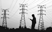 An Eskom worker checks power lines. There have been calls for striking workers to return to work amid the threat of stage 6 load-shedding. File photo. 