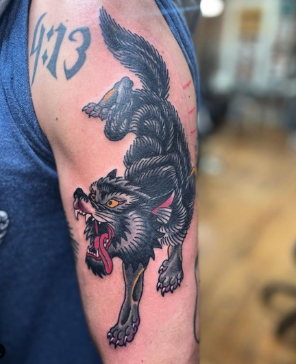 Traditional Angry Wolf Tattoo