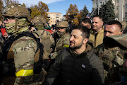 Ukrainian President Volodymyr Zelensky makes a surprise visit to Kherson on November 14, 2022 in Kherson, Ukraine. Zelensky wanted to offer support to residents of the liberated city occupied by Russian for over 8 months.  