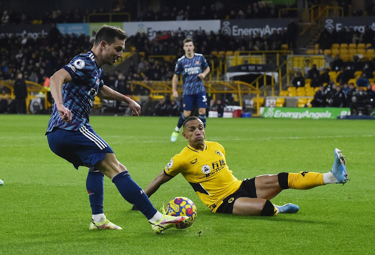 Wolverhampton Wanderers' Marcal in action with Arsenal's Cedric Soares