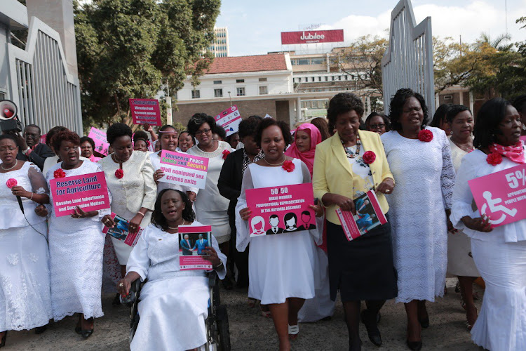 The Embrace Team on their way to submitting their memorandum to the Building Bridges Initiative on Thursday at the KICC,