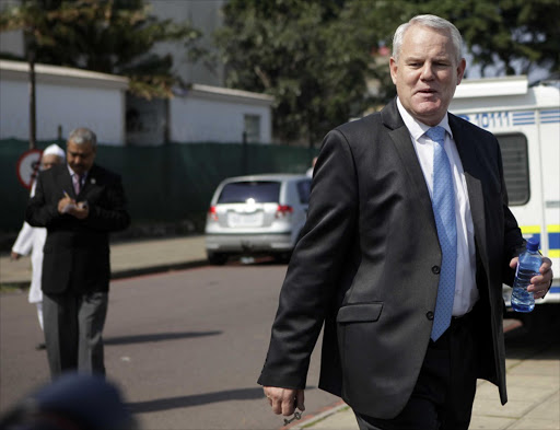FILE PICTURE: Major-General Johan Booysen Hawks boss in KwaZulu Natal leaves the Durban magistrate court. Pic: TEBOGO LETSIE. 24/08/2012. © Sunday Times